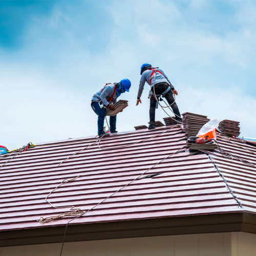 roofers-on-the-roof-of-a-house-repairing-it-warren-ri.jpg